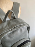 gray leather backpack