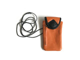 leather glasses case with a cord